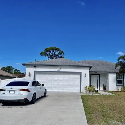 Buy this 4 bed house on 4262 Southwest McClellen Street in Port Saint Lucie, FL 34953