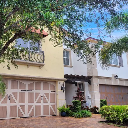 Buy this 3 bed townhouse on 2115 Sabal Tree Court in West Palm Beach, FL 33411