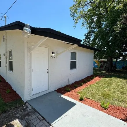 Rent this 2 bed house on 5815 Northwest 18th Avenue in Brownsville, Miami
