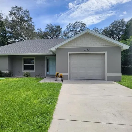 Rent this 3 bed house on 1182 Hallcrest Avenue in Spring Hill, FL 34608