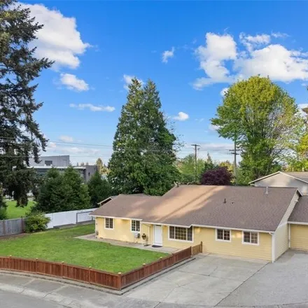 Buy this 4 bed house on Rose Hill Middle School in 13505 Northeast 75th Street, Redmond
