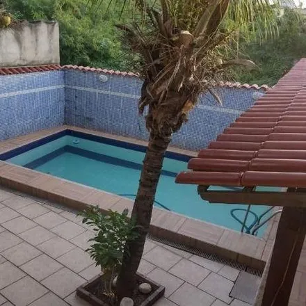 Buy this 3 bed house on Elite Rede de Ensino - São Gonçalo in Avenida Presidente Kennedy 95, Centro