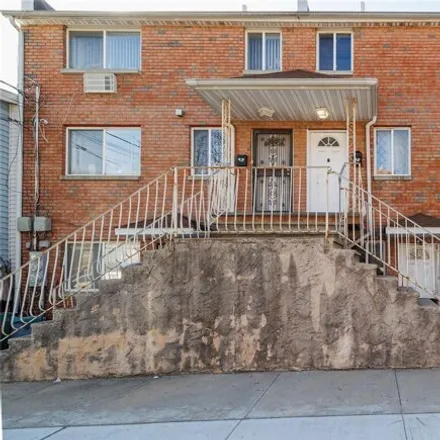 Buy this 5 bed house on 15-06 124th Street in New York, NY 11356