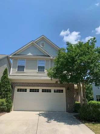 Rent this 4 bed house on 437 Windy Peak Loop in Cary, NC 27519