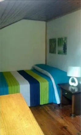 Rent this 6 bed room on Rua do Possolo 51 in 1350-251 Lisbon, Portugal