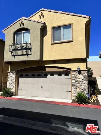 Rent this 4 bed townhouse on 21299 Ingomar Street in Los Angeles, CA 91304