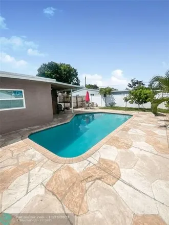Buy this 3 bed house on 1329 Northeast 25th Street in Collier Manor, Pompano Beach