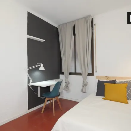 Rent this 4 bed room on Carrer Gran de Gràcia in 08001 Barcelona, Spain