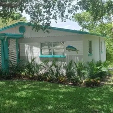 Rent this 2 bed house on 1887 Northeast Lake Place in Jensen Beach, FL 34957