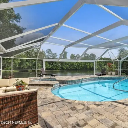 Buy this 4 bed house on 1845 Plantation Oaks Drive in Jacksonville, FL 32223