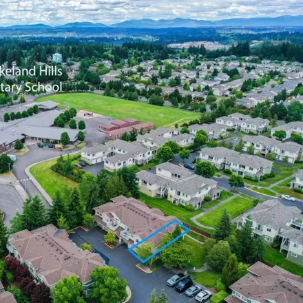 Buy this 2 bed condo on 6043 Isaac Avenue Southeast in Auburn, WA 98092