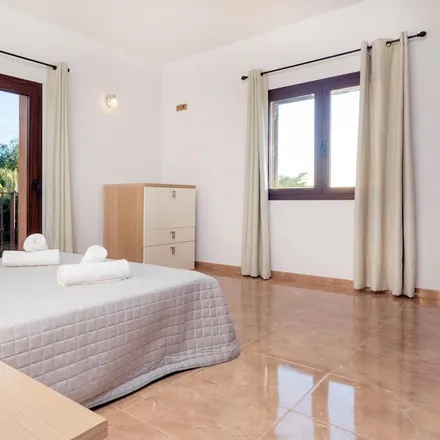 Rent this 5 bed house on Avinguda des Cap Martinet in 07819 Santa Eulària des Riu, Spain