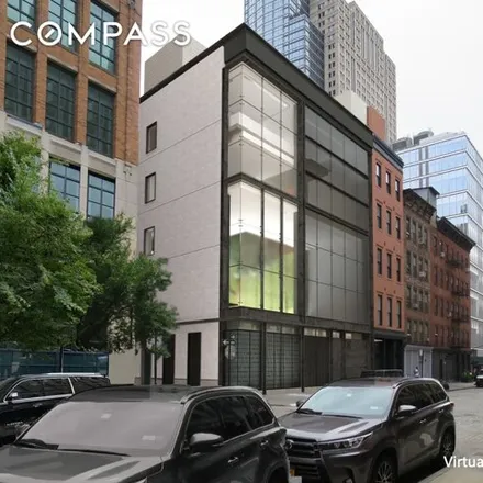 Buy this 7 bed house on 76 Collister Street in New York, NY 10013