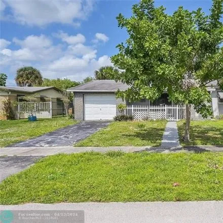 Buy this 2 bed house on 5843 Northwest 12th Street in Sunrise, FL 33313