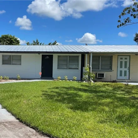 Rent this 3 bed townhouse on 1099 Vineyard Place in Lehigh Acres, FL 33936