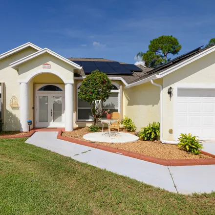 Buy this 3 bed house on 2885 Southeast Pace Drive in Port Saint Lucie, FL 34984