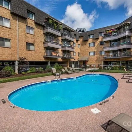 Buy this 2 bed condo on PLCMC - Myers Park Branch in 1361 Queens Road, Charlotte