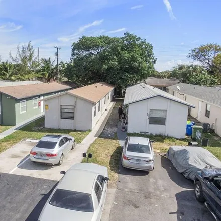 Buy this 4 bed house on 1040 Northwest 6th Avenue in Middle River Vista, Fort Lauderdale