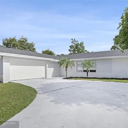 Buy this 3 bed house on 1829 Hiltonia Circle in West Palm Beach, FL 33407