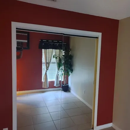 Rent this 1 bed room on Basingstoke Court in Poinciana, FL