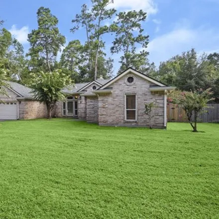 Rent this 4 bed house on 3 Twelve Pines Ct in Spring, Texas