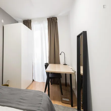 Rent this 11 bed room on Calle de Cedaceros in 8, 28014 Madrid