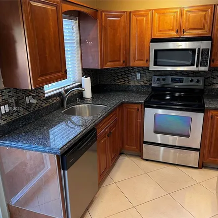 Rent this 2 bed apartment on 77 Northeast 20th Court in Wilton Manors, FL 33305