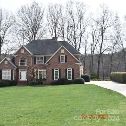 Buy this 3 bed house on 1120 Village Lake Drive in Monroe, NC