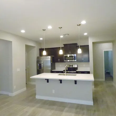 Rent this 4 bed apartment on 3739 South 183rd Drive in Goodyear, AZ 85338