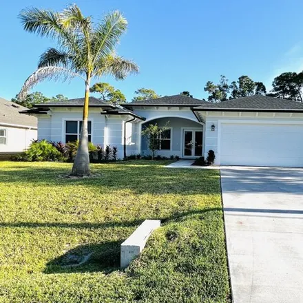 Rent this 4 bed house on 5829 Wesley Road in Port Saint Lucie, FL 34986