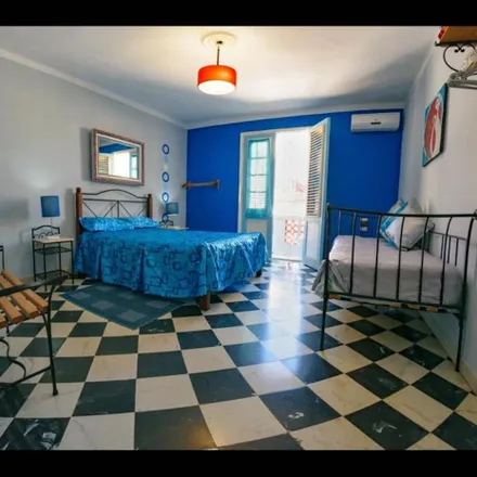 Rent this 1 bed apartment on Antonia’s Restaurant in Compostela #116, Havana