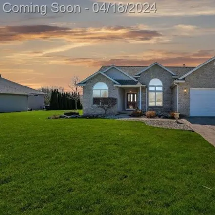 Buy this 4 bed house on 7075 Crosswinds Drive in Clayton Charter Township, MI 48473
