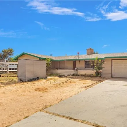 Buy this 2 bed house on 25088 Sholic Road in Apple Valley, CA 92308