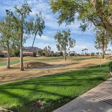 Rent this 3 bed condo on Jack Nicklaus Resort Golf Course in Aronomink, La Quinta