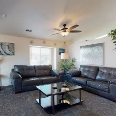 Rent this 4 bed apartment on 3462 Hunters Meadows Circle Northeast in Northern Meadows, Rio Rancho
