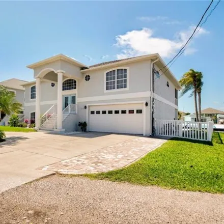 Buy this 5 bed house on 7313 Mako Drive in Hudson, FL 34667