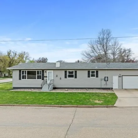 Buy this 4 bed house on 1104 6th Avenue Northwest in Minot, ND 58703