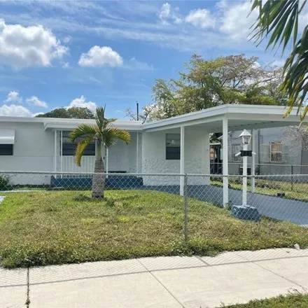 Rent this 3 bed house on 930 Burlington Street in Opa-locka, FL 33054