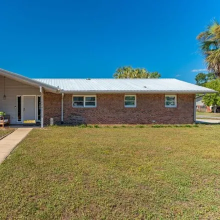 Buy this 3 bed house on 1501 Royal Palm Drive in Niceville, FL 32578