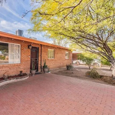 Buy this 4 bed house on 6350 East Barnan Street in Tucson, AZ 85710