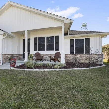Buy this 3 bed house on 2698 East 39th Street in Lynn Haven, FL 32405