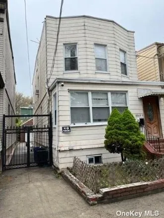 Buy this 4 bed townhouse on 80-49 88th Road in New York, NY 11421