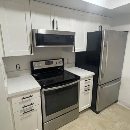 Rent this 3 bed condo on South Park Road in Hollywood, FL 33023