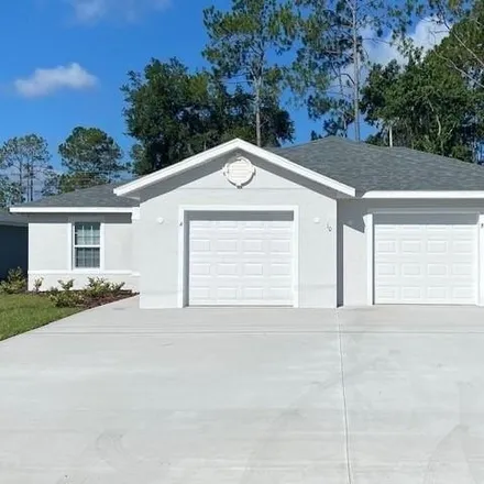 Rent this 3 bed house on 10 Rainstone Lane in Palm Coast, FL 32164