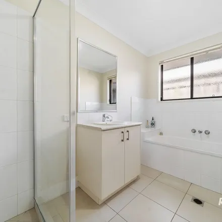 Rent this 4 bed apartment on Hallow Crescent in Augustine Heights QLD 4300, Australia