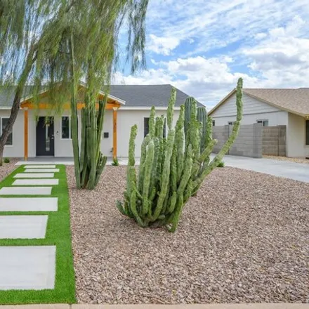 Buy this 4 bed house on 1351 East Clarendon Avenue in Phoenix, AZ 85014