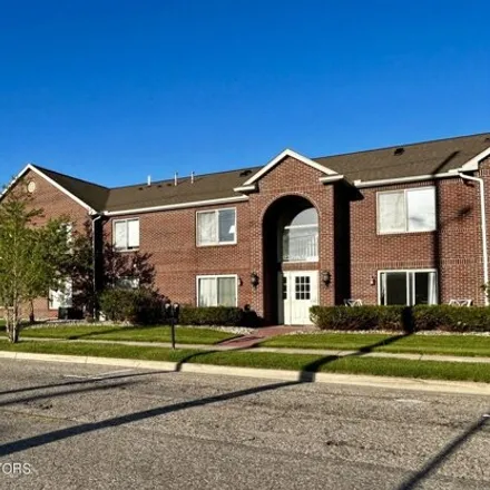 Buy this 2 bed condo on East Shiawassee Street in Lansing, MI 48912