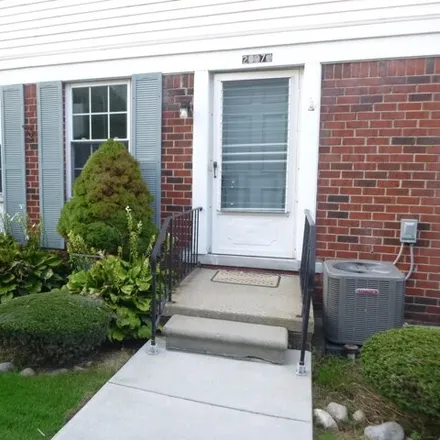 Rent this 2 bed condo on 34750 East Lake Drive in Harrison Township, MI 48045