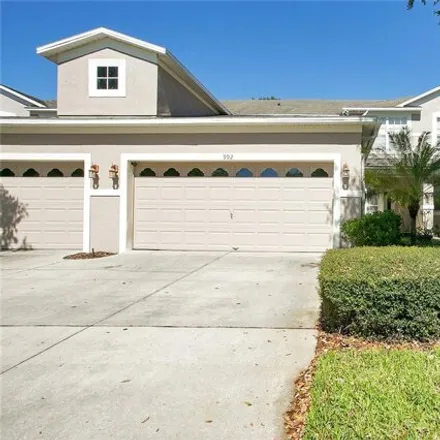Rent this 3 bed townhouse on 974 Crestwood Commons Avenue in Ocoee, FL 34761