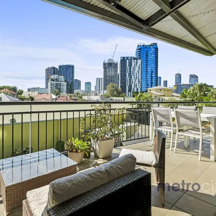 Rent this 2 bed apartment on The Village West in 30 Mollison Street, West End QLD 4101